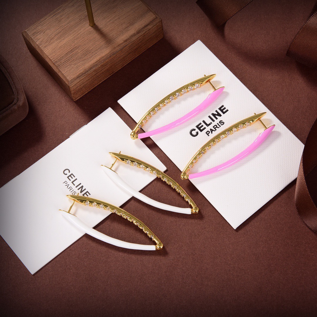 Celine PRECLOUS earrings 18k gold tone metal with clear crystals available in white enamel and pink enamel variants 5cm length