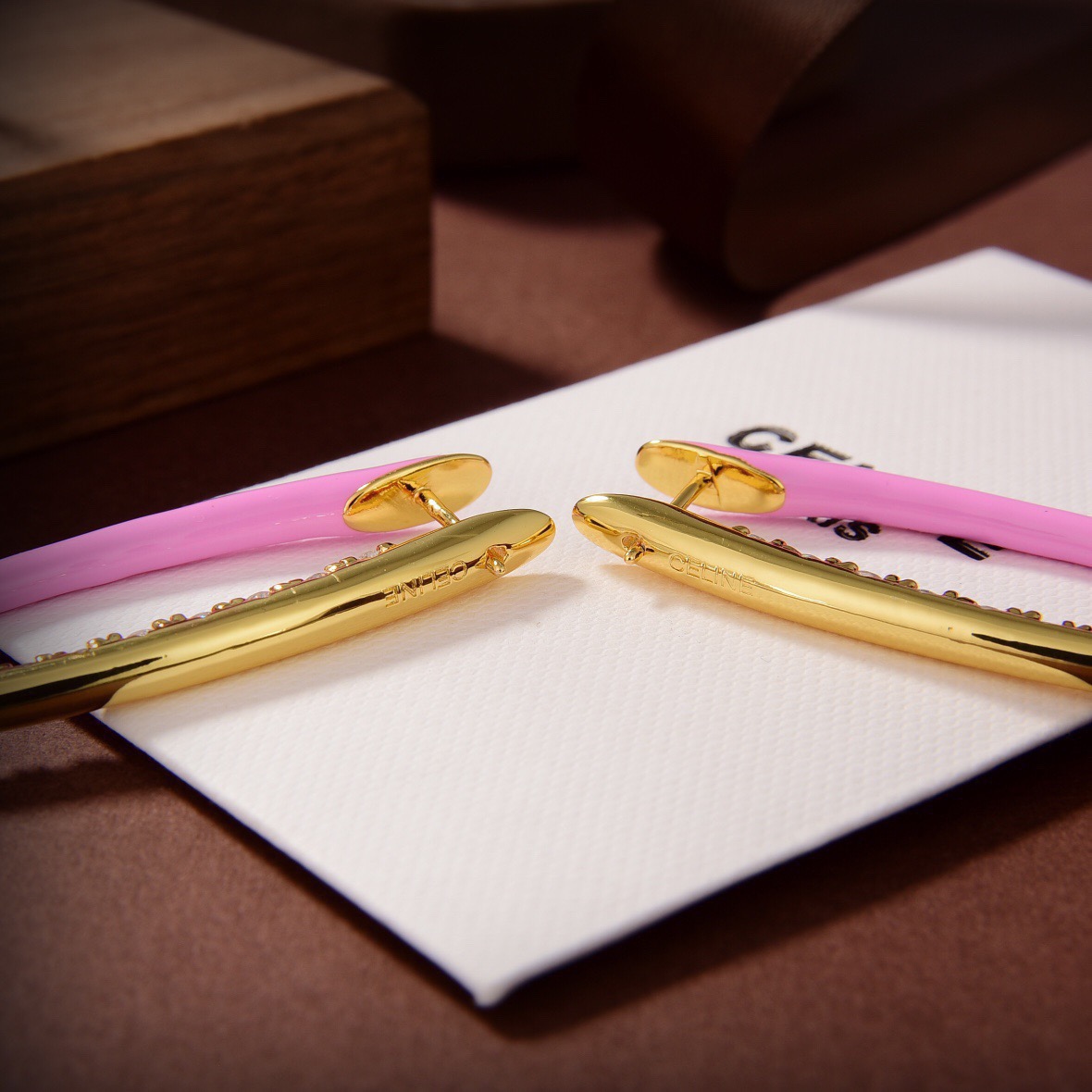 Celine PRECLOUS earrings 18k gold tone metal with clear crystals available in white enamel and pink enamel variants 5cm length