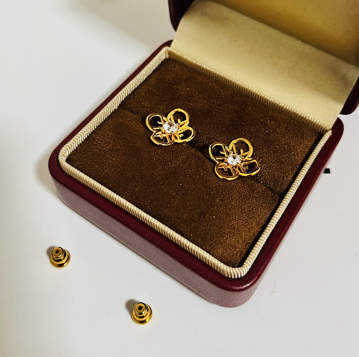 Fendi FF Logo Flower Stud Earrings earrings gold-tone metal with clear faceted center stone 10mm stud diameter