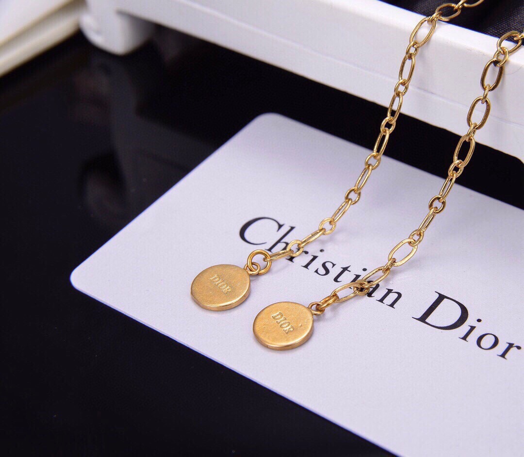 Dior J Adior CD Choker necklace Antique gold-tone metal with black and white striped ribbon or antique gold-tone metal with pink and white striped ribbon 35cm with 5cm extension chain