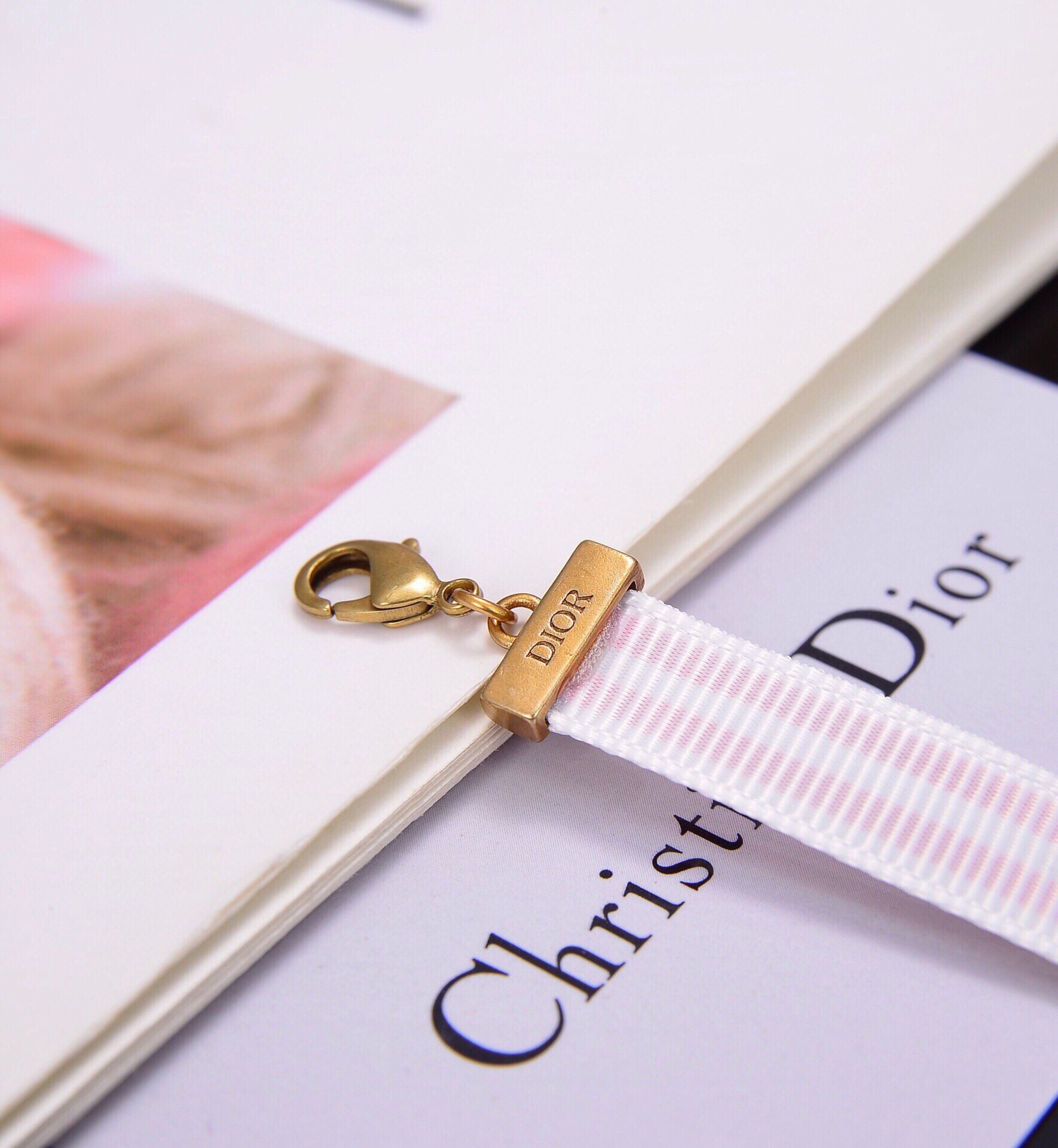 Dior J Adior CD Choker necklace Antique gold-tone metal with black and white striped ribbon or antique gold-tone metal with pink and white striped ribbon 35cm with 5cm extension chain