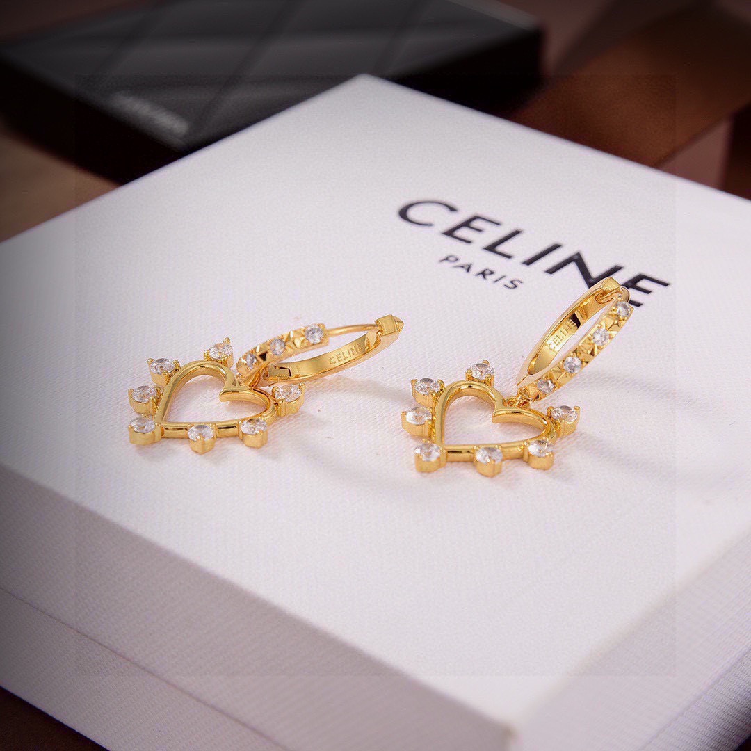Celine Crystal Heart Charm Hoop Earrings earrings gold-tone metal with clear faceted crystals 1 2cm hoop diameter 2 2cm total drop length