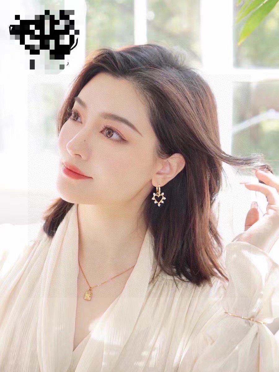 Celine Crystal Heart Charm Hoop Earrings earrings gold-tone metal with clear faceted crystals 1 2cm hoop diameter 2 2cm total drop length