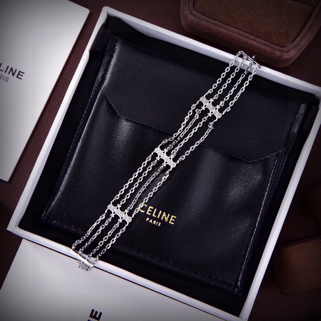 Celine Triomphe Multi bracelet 18k gold tone brass rhodium silver tone brass no gemstones 19cm with 3cm extension chain