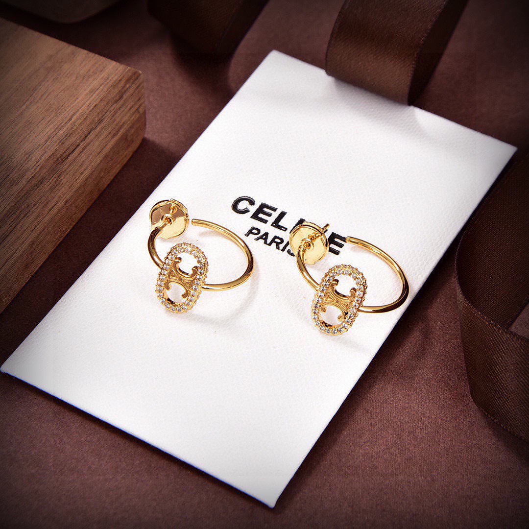 Celine Maillon Triomphe earrings gold-tone metal with clear diamond-like accent stones 1 5cm hoop diameter