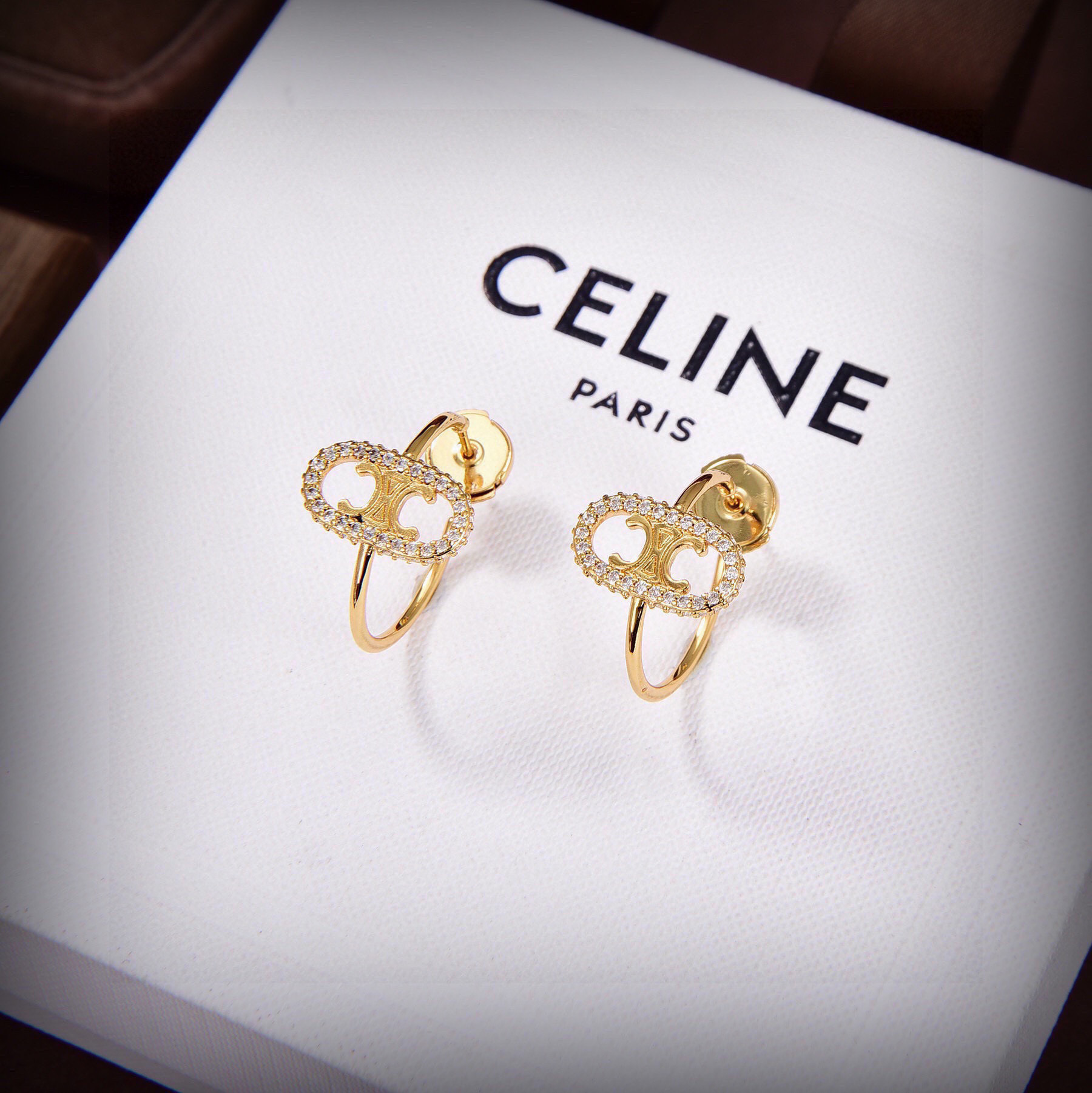 Celine Maillon Triomphe earrings gold-tone metal with clear diamond-like accent stones 1 5cm hoop diameter