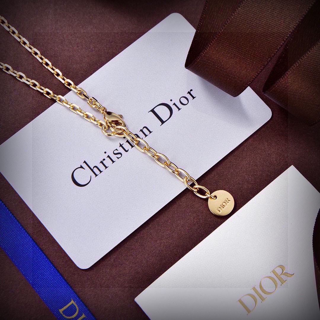 Dior Paris Landmark Charms necklace gold-tone metal with white pearls and clear crystal accents 42cm with 5cm extender