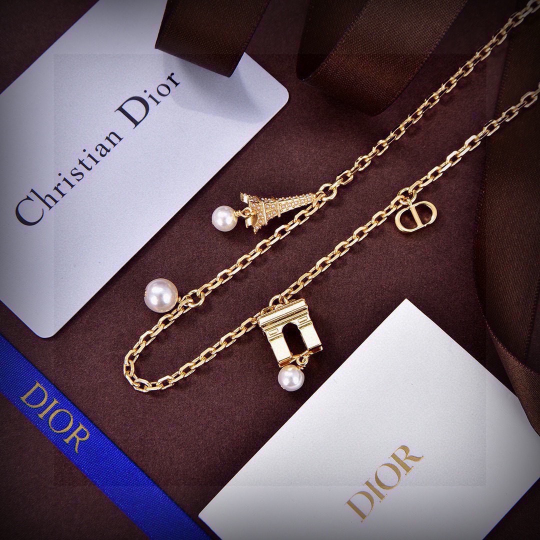 Dior Paris Landmark Charms necklace gold-tone metal with white pearls and clear crystal accents 42cm with 5cm extender