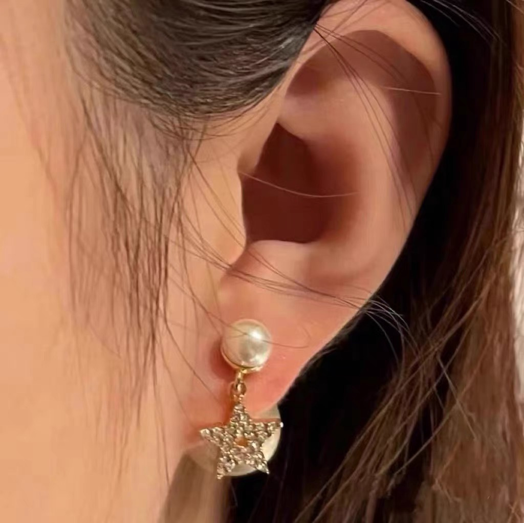 Dior Tribales earrings Gold-tone metal white resin pearl clear silver-toned crystal accents One size post-style earrings no adjustable chain length