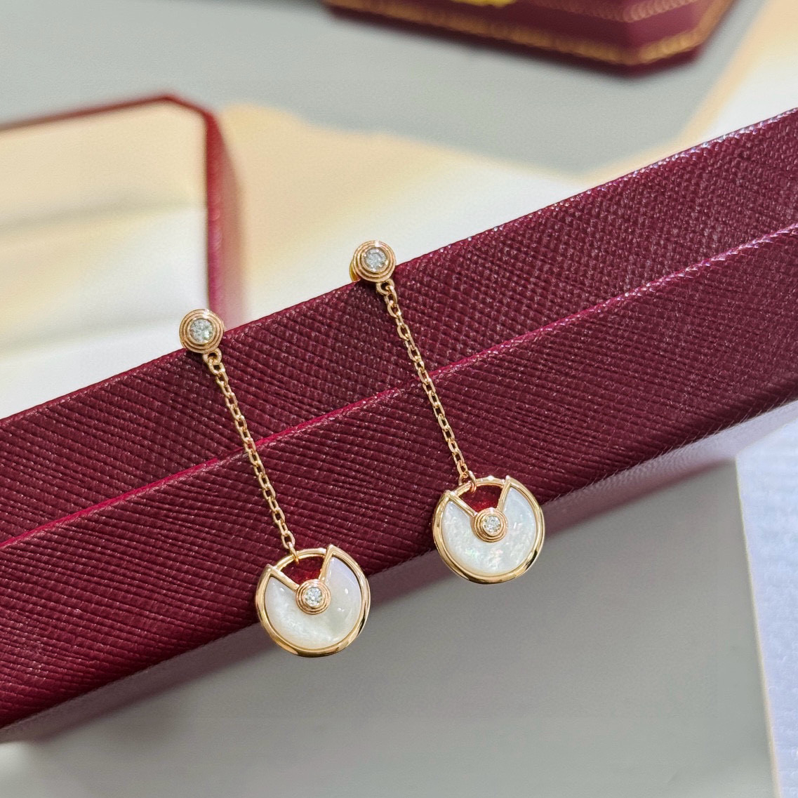 Cartier Amulette de Cartier earrings rose gold metal with red carnelian and clear diamond accents total drop length 2 5cm