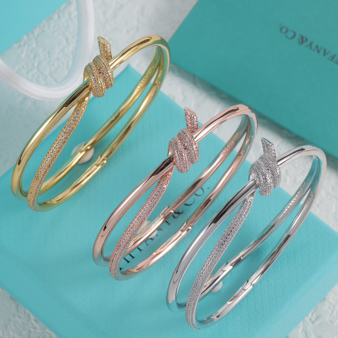 Tiffany Co Fate Knot bracelet Available in 18k white gold 18k yellow gold 18k rose gold all set with pave-set clear diamonds 17cm inner circumference