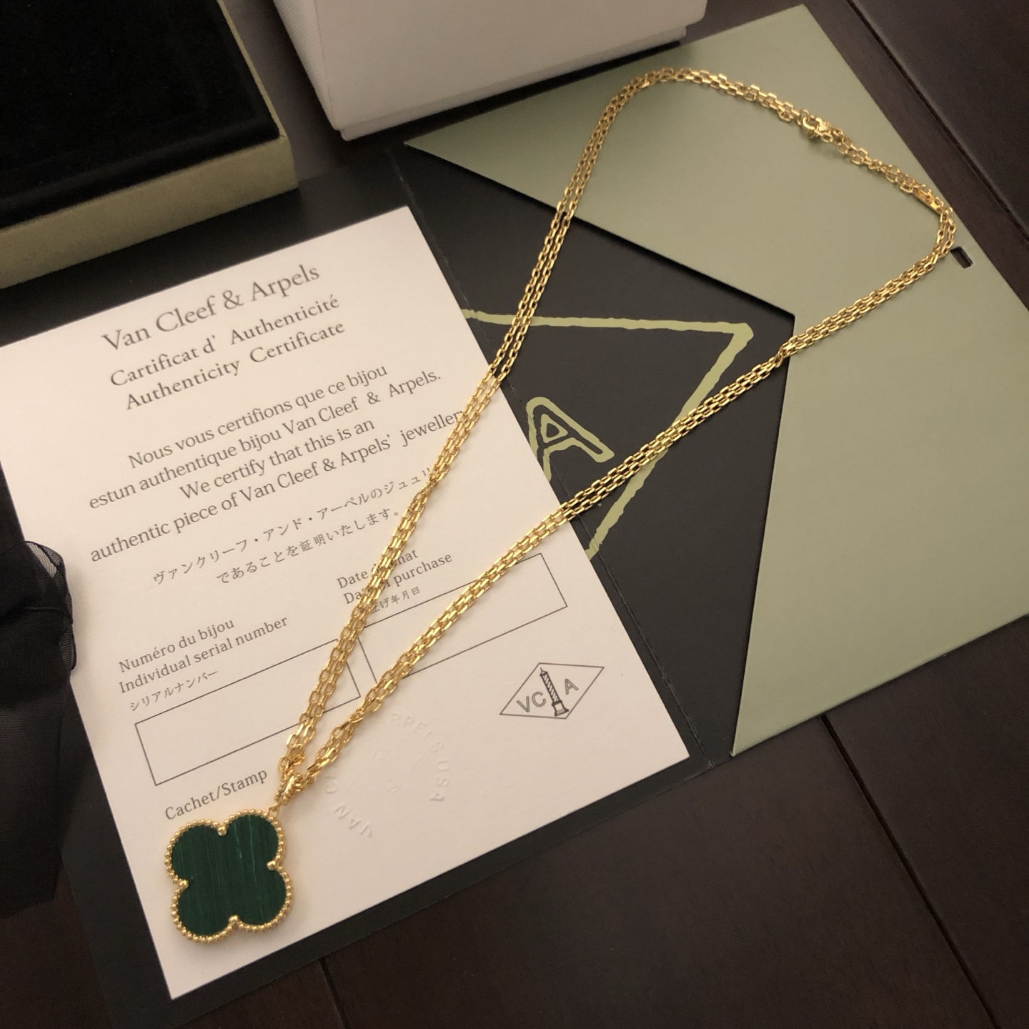 Van Cleef Arpels Magic Alhambra necklace 18k yellow gold with carnelian and malachite clover motifs 25mm pendant