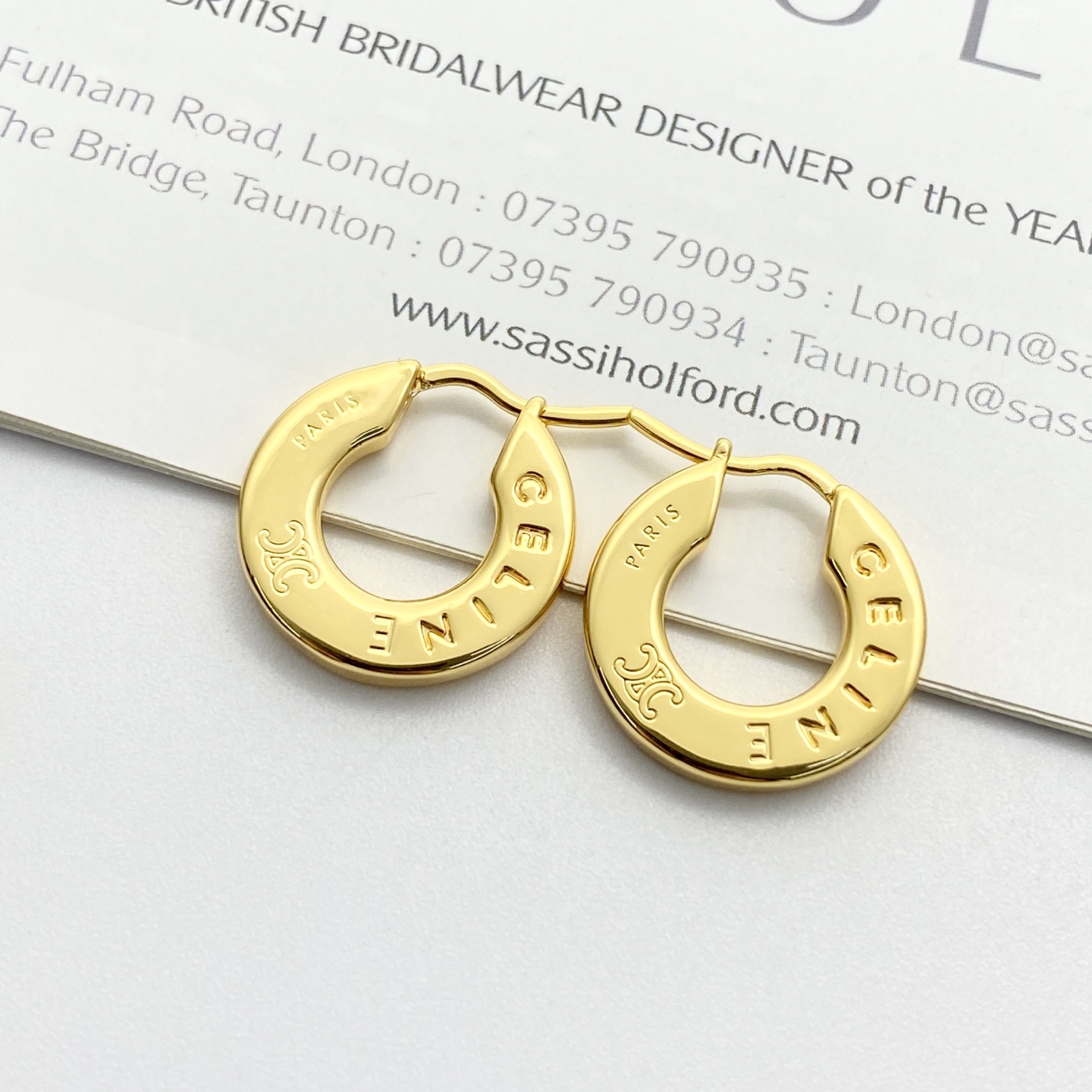 Celine Triomphe Paris Logo Hoop Earrings earrings gold-tone metal no gemstones 20mm outer diameter