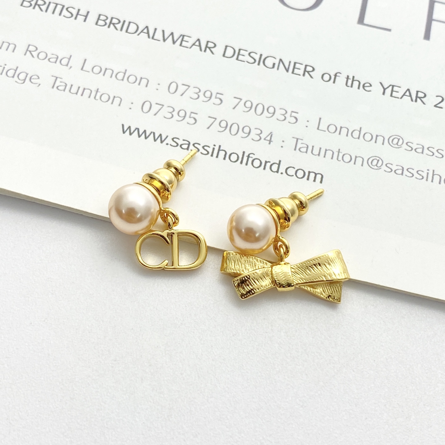 Dior Tribales CD Bow Pearl Earrings earrings Gold-tone metal with cream white faux pearls One Size post length 1cm drop length 1 5cm