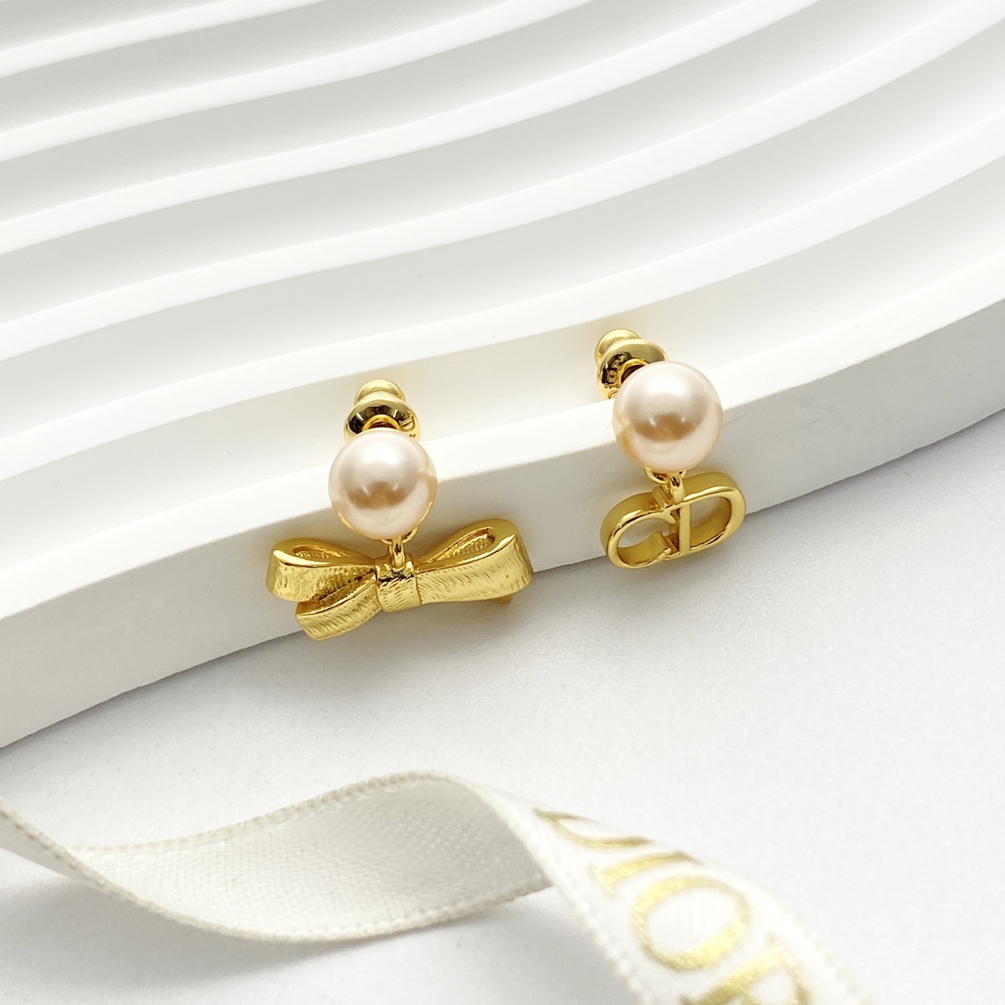 Dior Tribales CD Bow Pearl Earrings earrings Gold-tone metal with cream white faux pearls One Size post length 1cm drop length 1 5cm