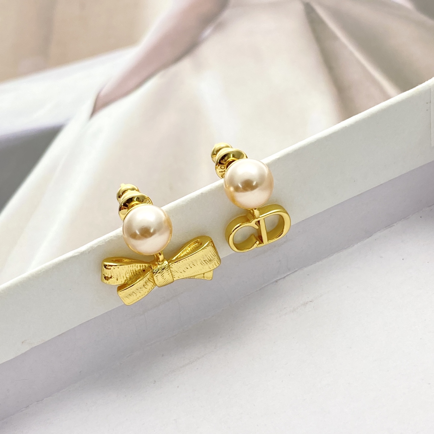 Dior Tribales CD Bow Pearl Earrings earrings Gold-tone metal with cream white faux pearls One Size post length 1cm drop length 1 5cm