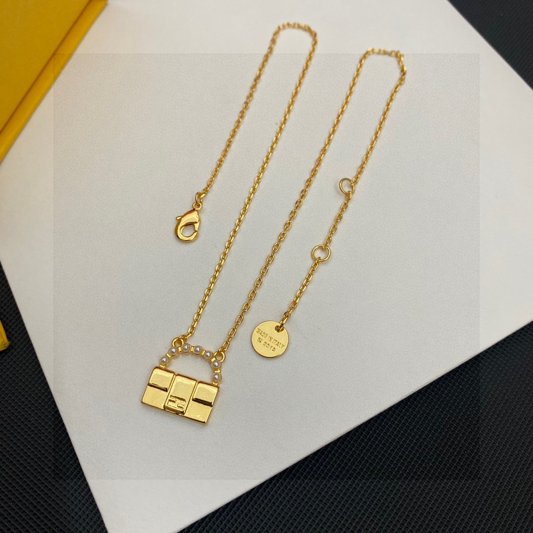 Fendi Baguette Bag Charm Pendant Necklace necklace gold-tone metal with white faux pearl accents 45cm with 5cm extender