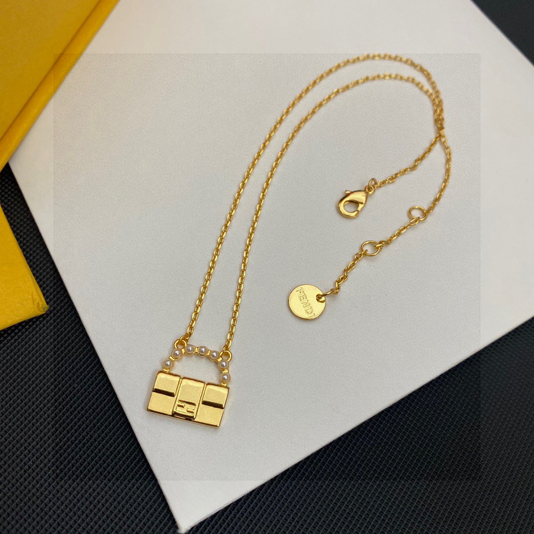 Fendi Baguette Bag Charm Pendant Necklace necklace gold-tone metal with white faux pearl accents 45cm with 5cm extender