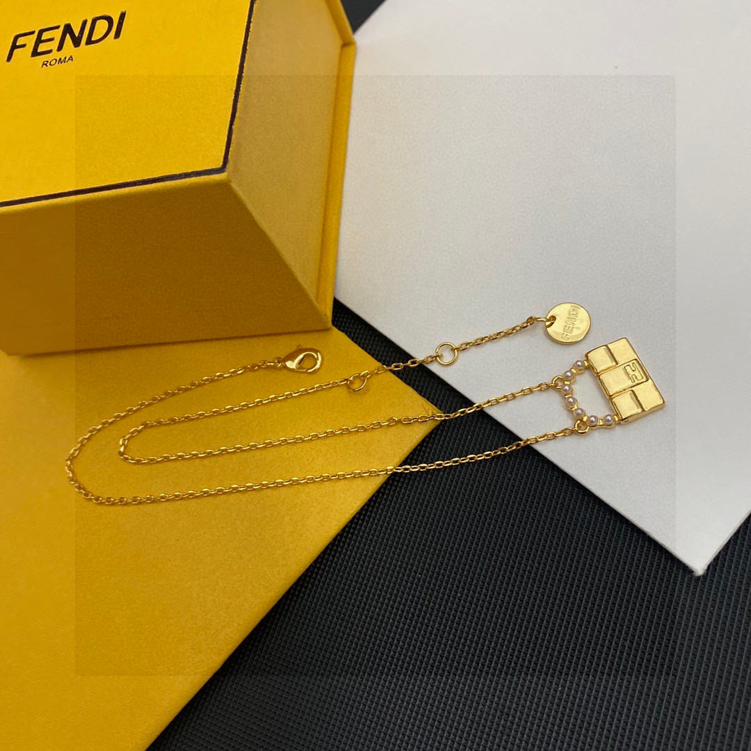 Fendi Baguette Bag Charm Pendant Necklace necklace gold-tone metal with white faux pearl accents 45cm with 5cm extender