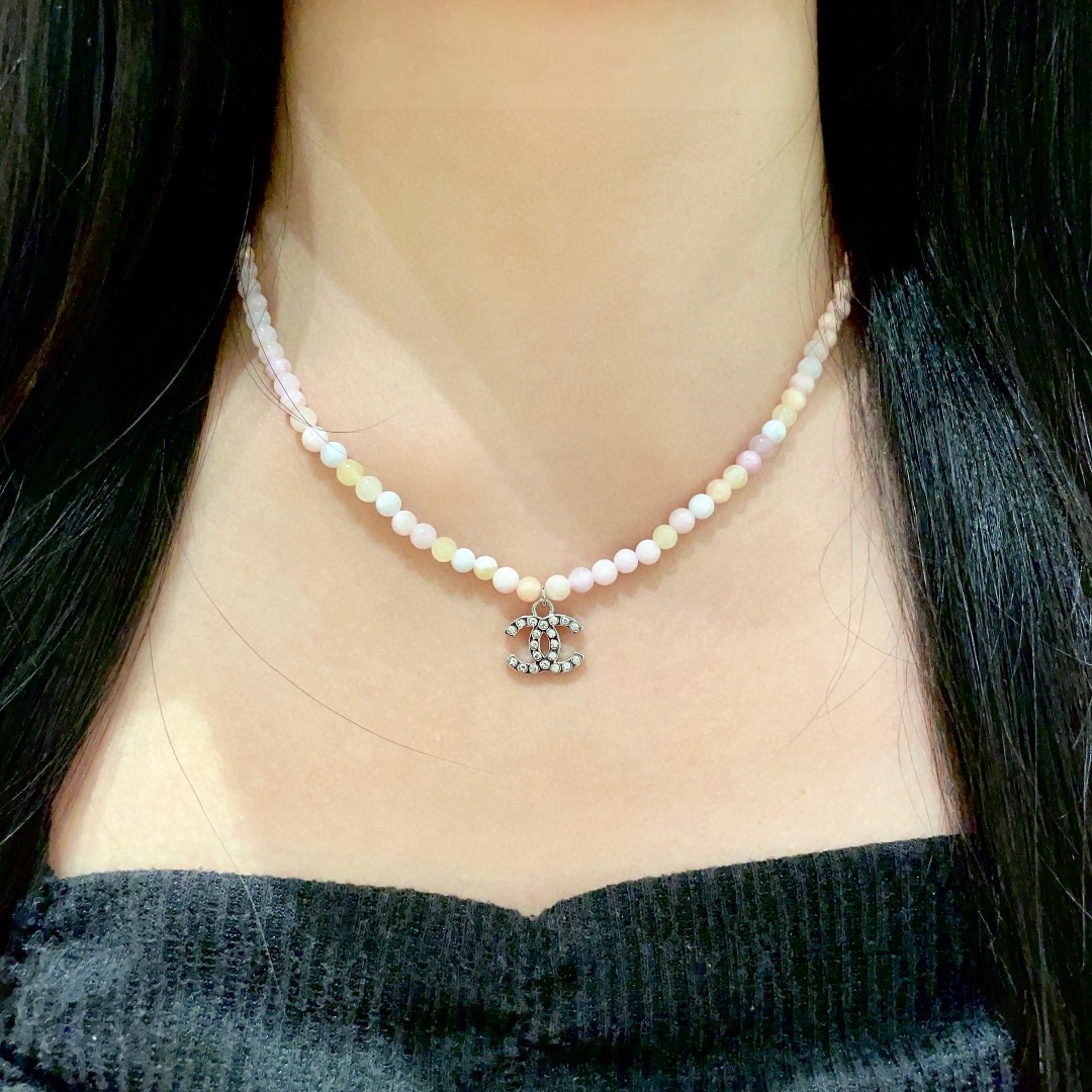 Chanel CC Logo Pastel Bead Choker necklace Silver-tone metal with clear crystal accents pastel pink cream pale yellow and white beaded chain 40cm with 5cm extender