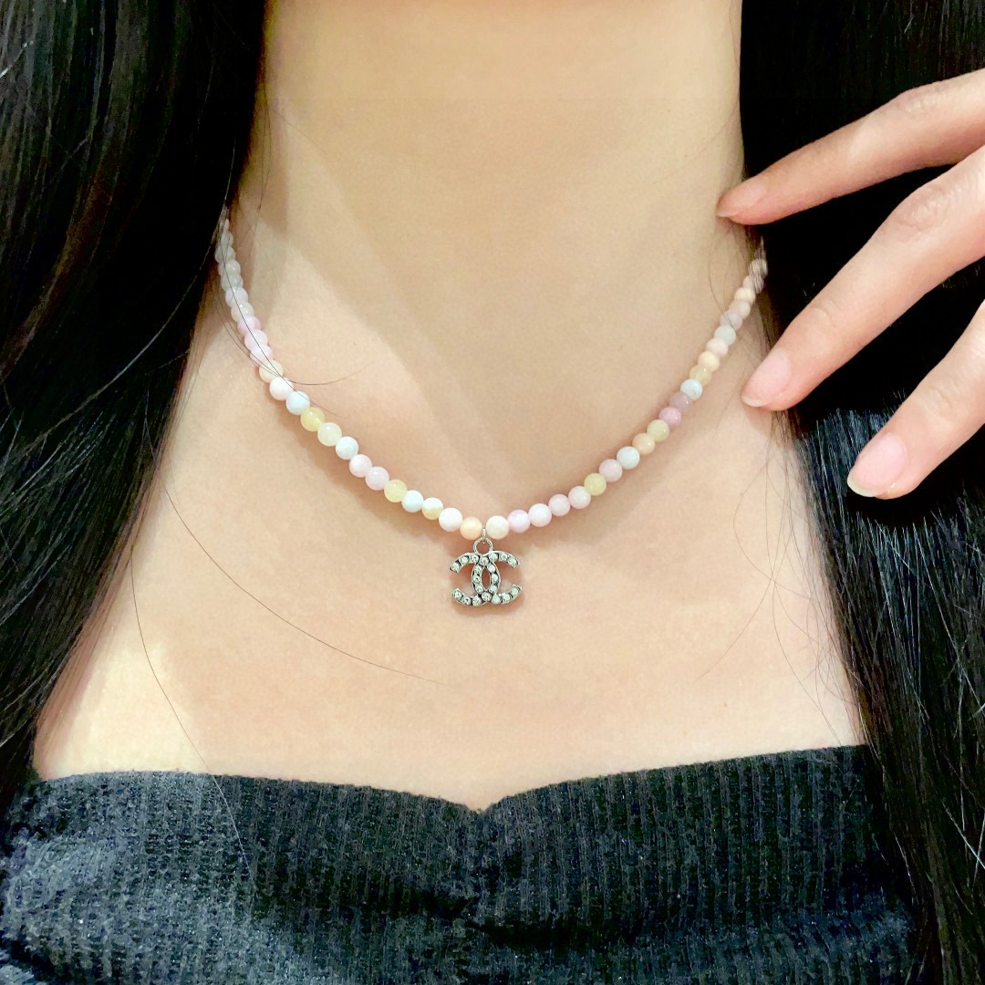 Chanel CC Logo Pastel Bead Choker necklace Silver-tone metal with clear crystal accents pastel pink cream pale yellow and white beaded chain 40cm with 5cm extender