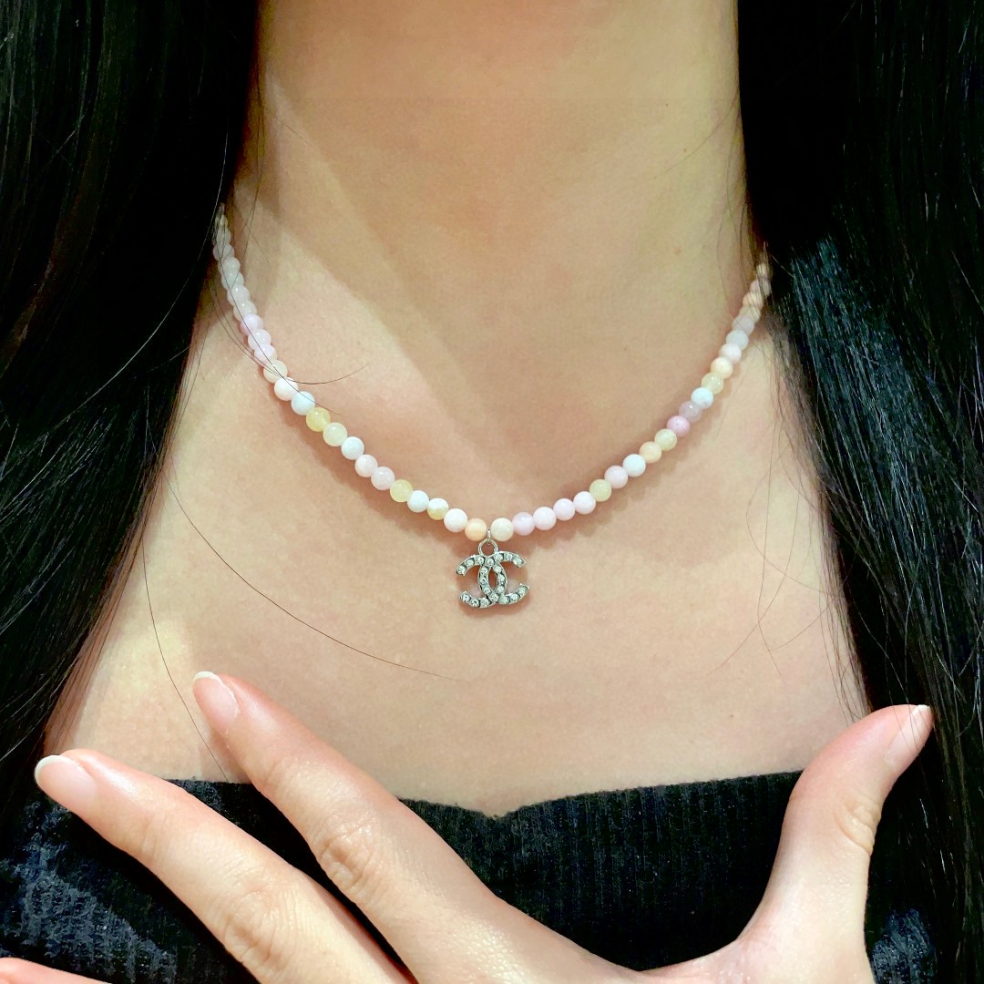 Chanel CC Logo Pastel Bead Choker necklace Silver-tone metal with clear crystal accents pastel pink cream pale yellow and white beaded chain 40cm with 5cm extender
