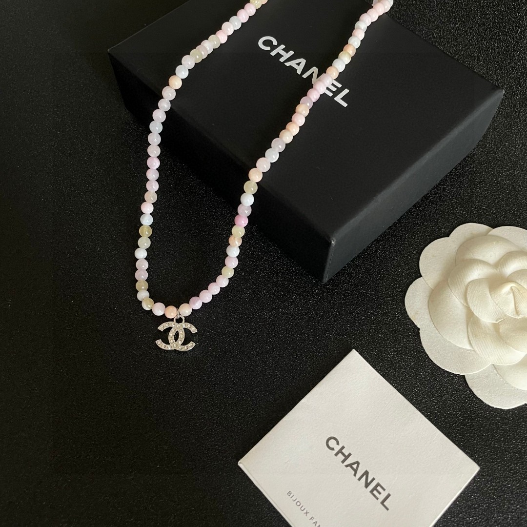 Chanel CC Logo Pastel Bead Choker necklace Silver-tone metal with clear crystal accents pastel pink cream pale yellow and white beaded chain 40cm with 5cm extender