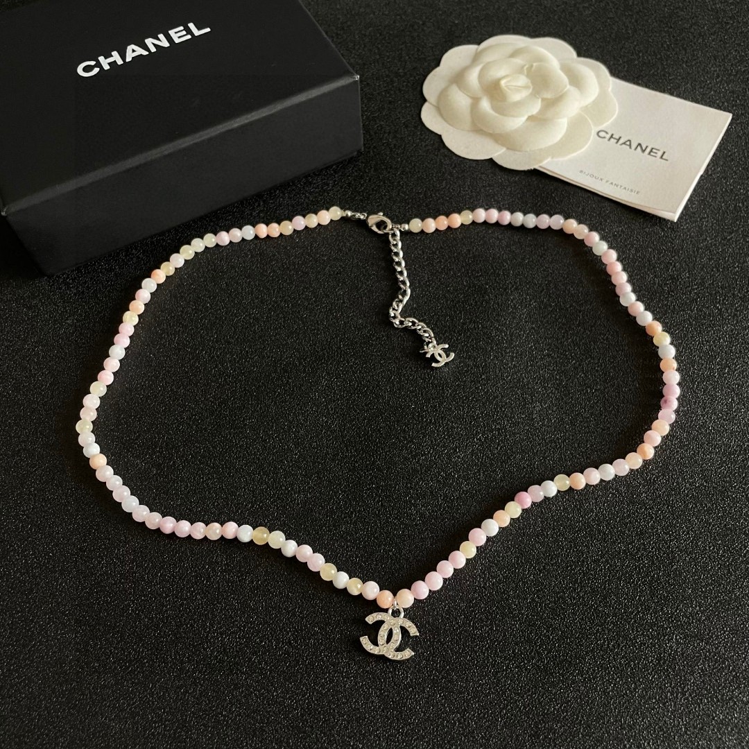 Chanel CC Logo Pastel Bead Choker necklace Silver-tone metal with clear crystal accents pastel pink cream pale yellow and white beaded chain 40cm with 5cm extender