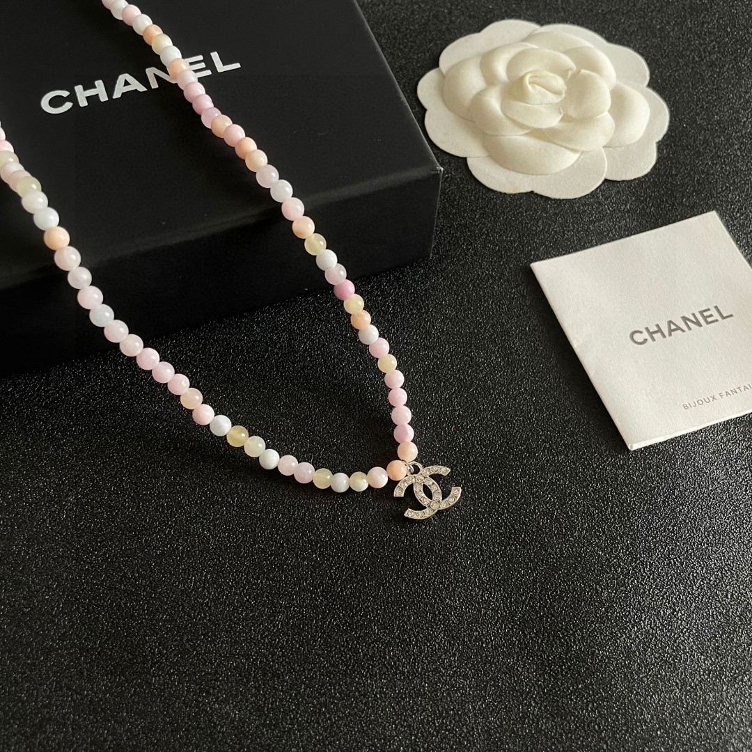 Chanel CC Logo Pastel Bead Choker necklace Silver-tone metal with clear crystal accents pastel pink cream pale yellow and white beaded chain 40cm with 5cm extender