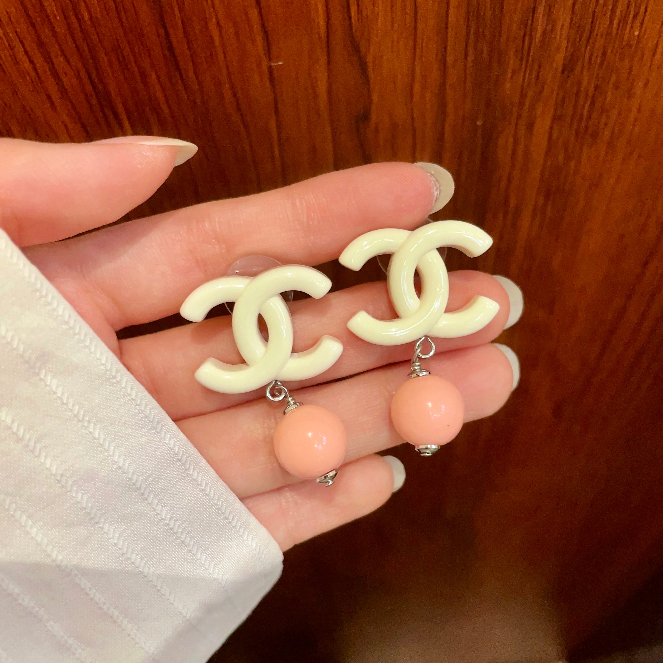 Chanel CC Logo Drop Earrings earrings Cream white resin CC logo coral pink resin bead silver tone metal hardware One Size post style total drop length approx 2 5cm