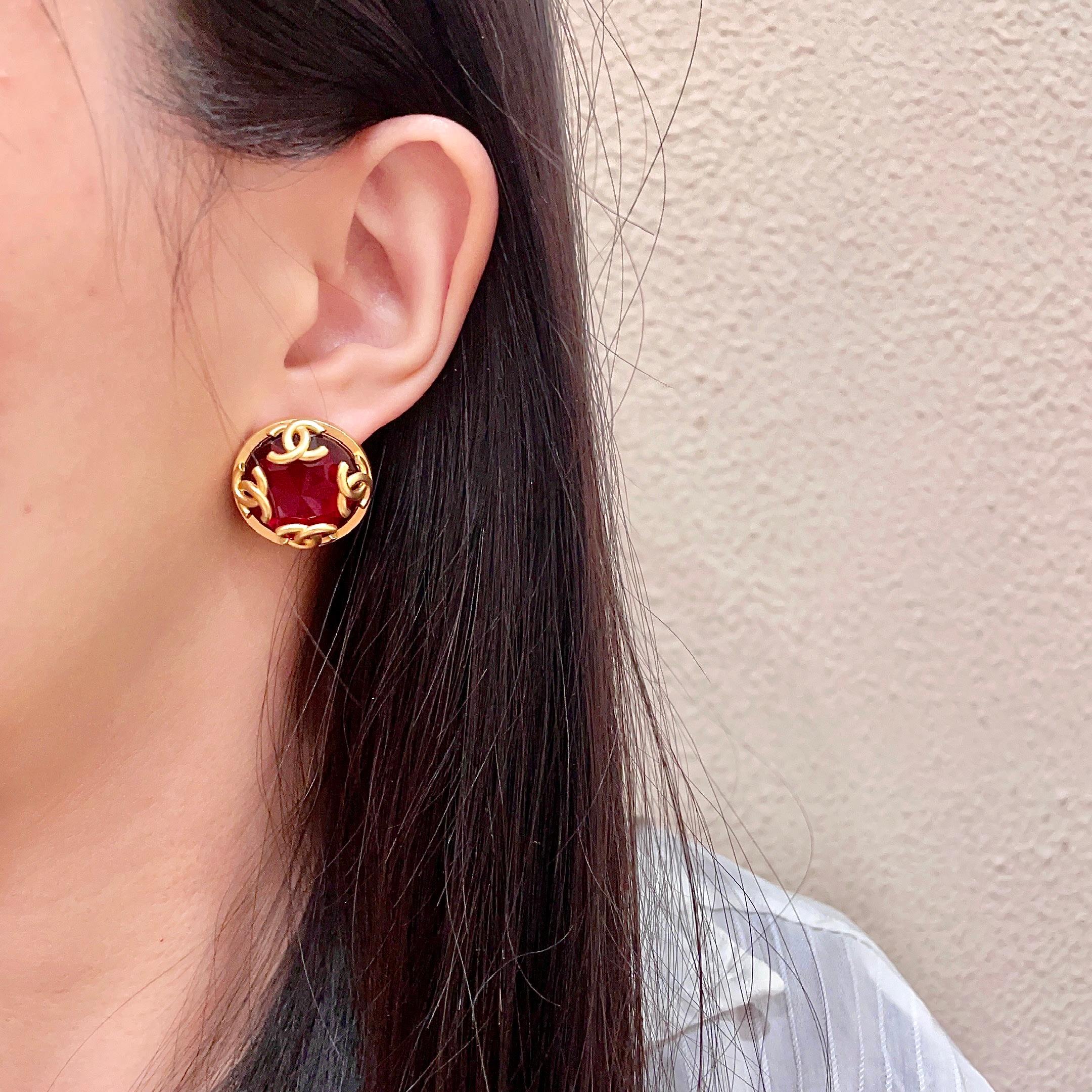 Chanel CC Logo Faceted Stone Stud Earrings earrings Gold-tone metal with deep red faceted resin stone 2cm diameter