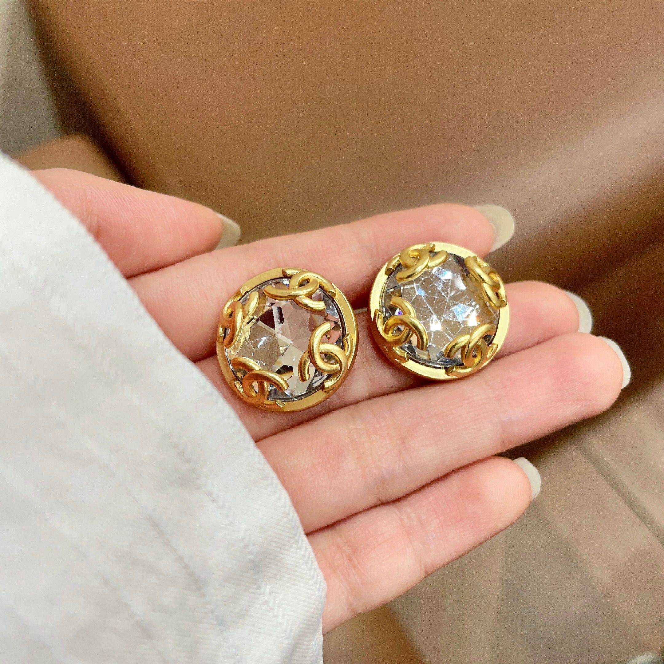 Chanel CC Logo Faceted Crystal Round Stud Earrings earrings Gold-tone metal with clear faceted crystal 2cm diameter