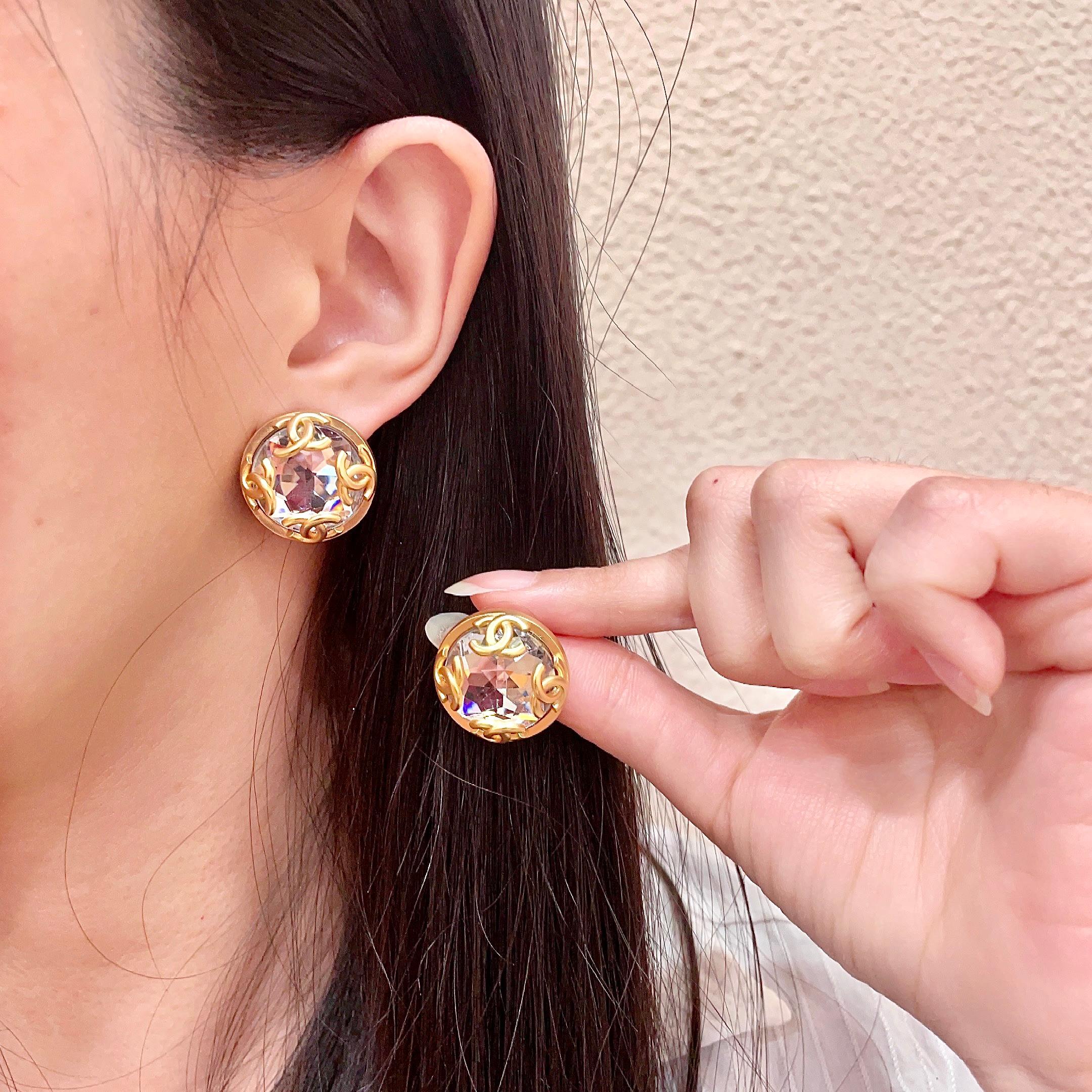 Chanel CC Logo Faceted Crystal Round Stud Earrings earrings Gold-tone metal with clear faceted crystal 2cm diameter