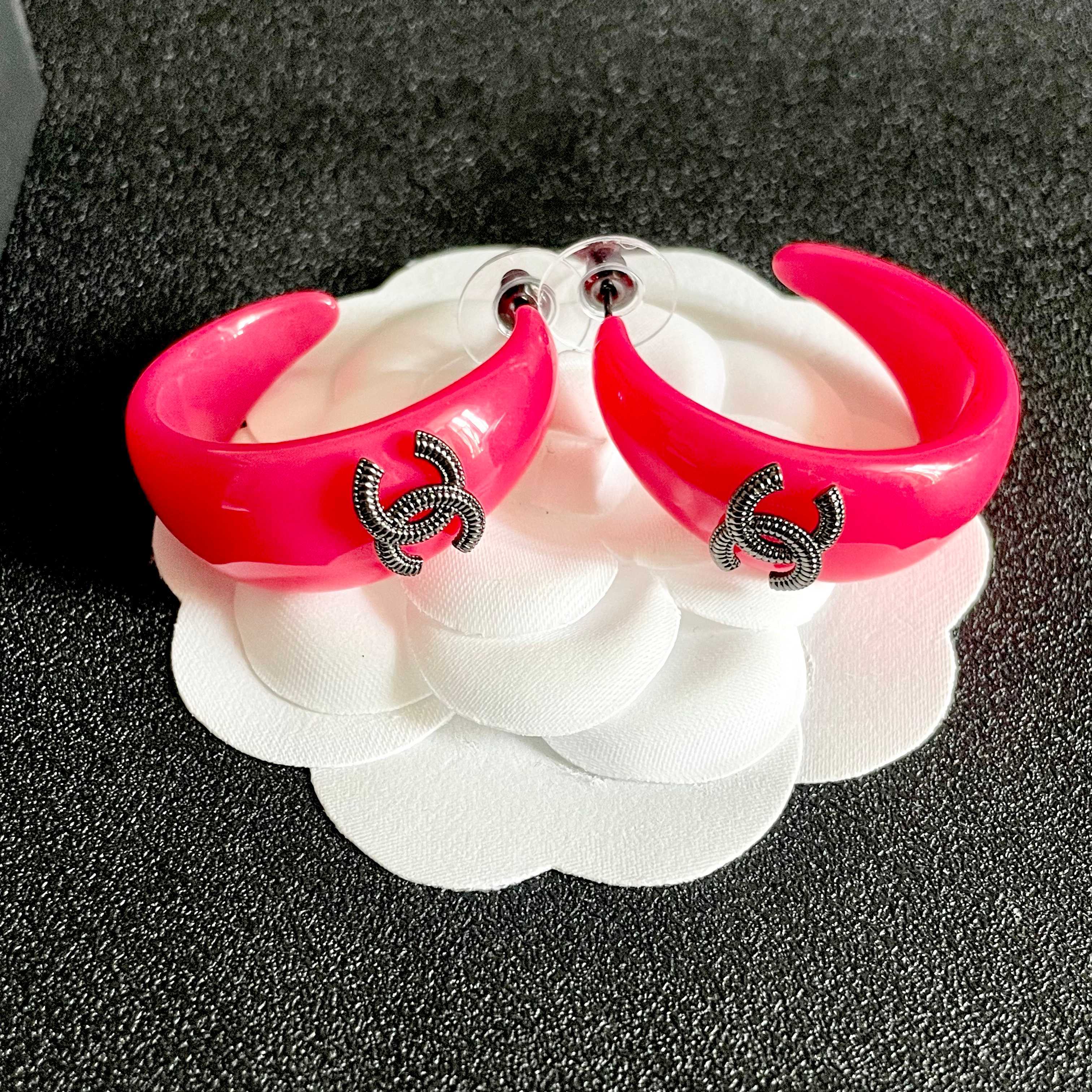 Chanel CC Logo Resin Hoop Earrings earrings Neon hot pink resin gunmetal-tone metal CC logo 3cm hoop length