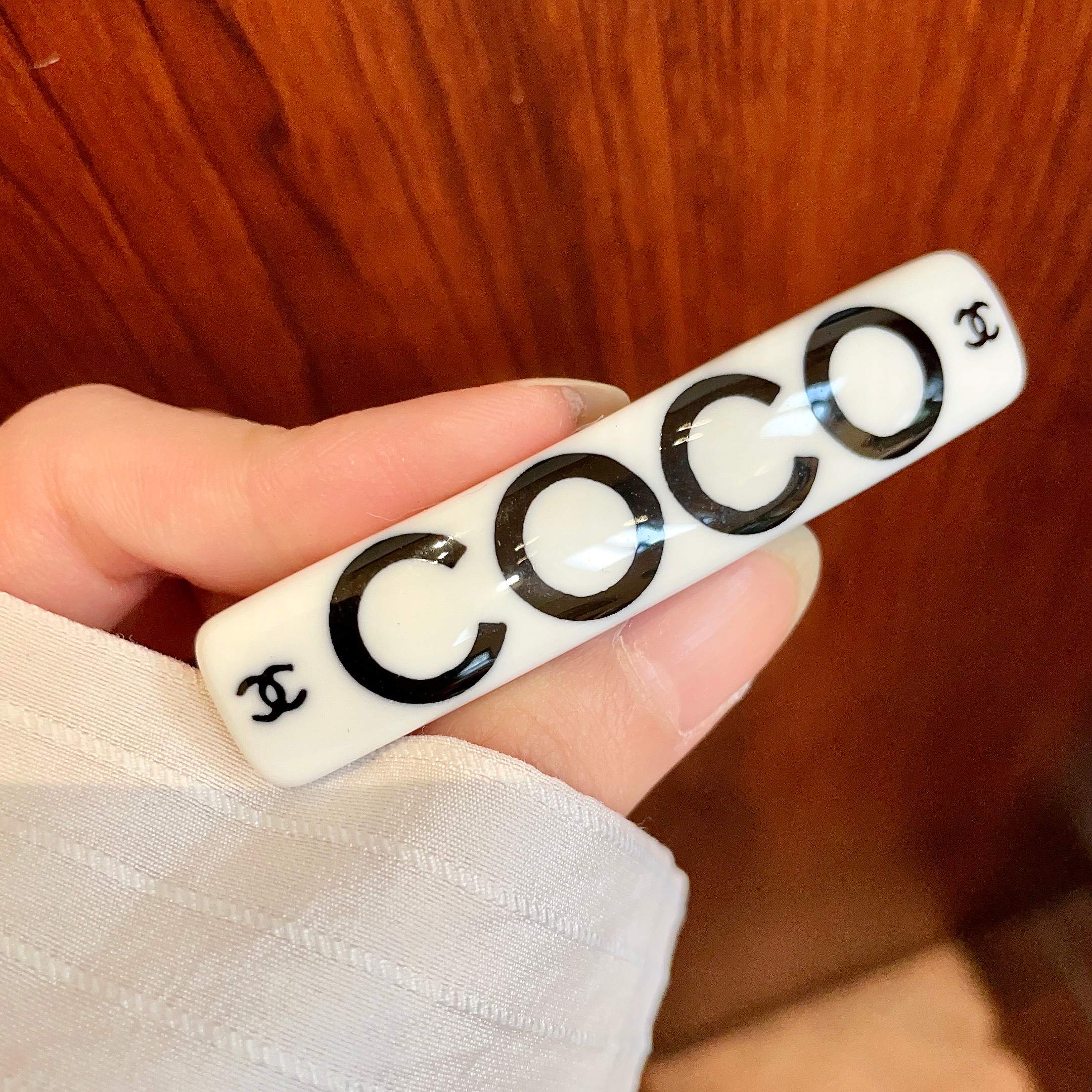 Chanel COCO brooch white base with black printed logos and lettering 6cm
