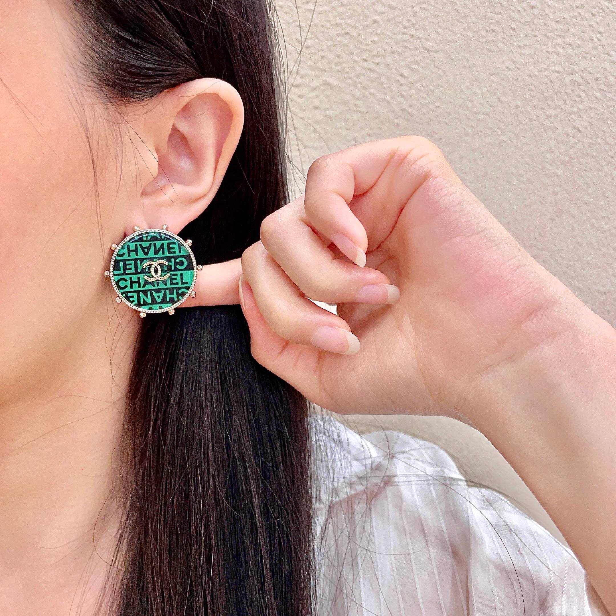 Chanel CC Logo Round Stud Earrings earrings Gold-tone metal with green and black enamel clear crystal accents 2 5cm diameter