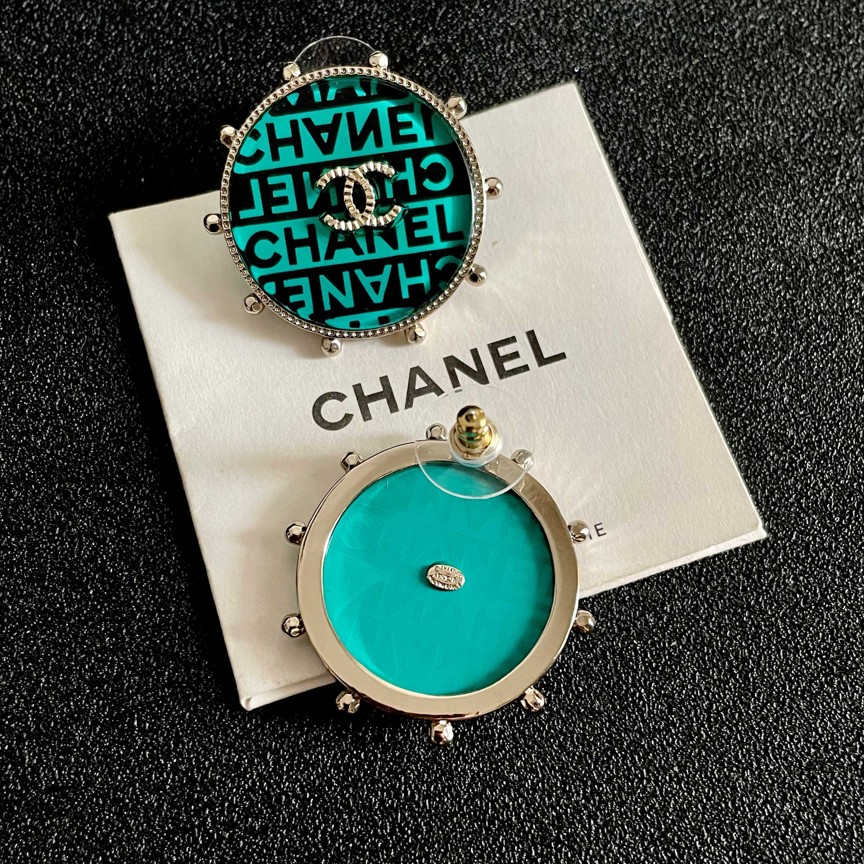 Chanel CC Logo Round Stud Earrings earrings Light gold-tone metal with turquoise and black enamel crystal-embellished interlocking CC logo 2 5cm diameter