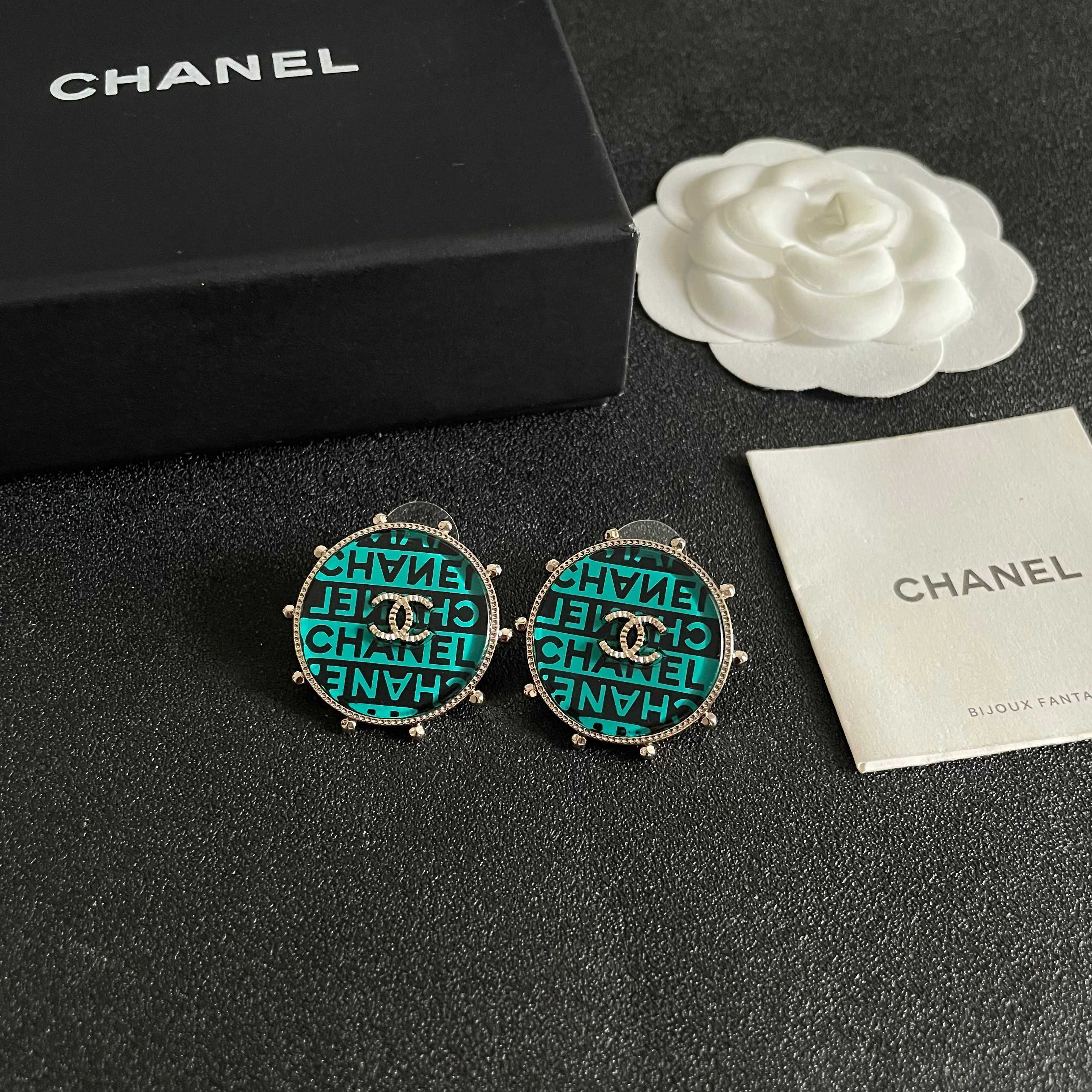 Chanel CC Logo Round Stud Earrings earrings Light gold-tone metal with turquoise and black enamel crystal-embellished interlocking CC logo 2 5cm diameter