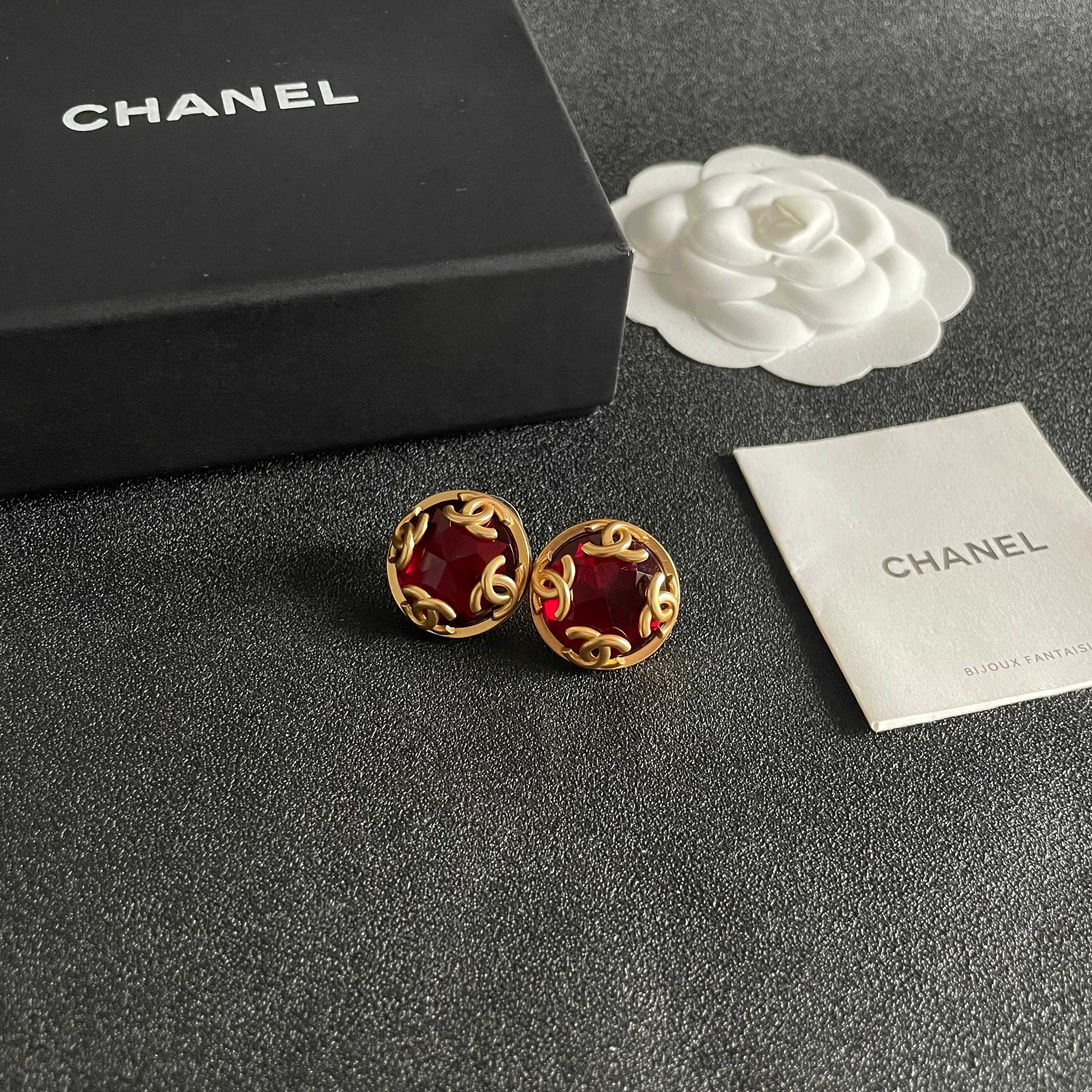 Chanel CC Logo Faceted Stone Stud Earrings earrings Gold-tone metal with deep red faceted resin stone 2cm diameter