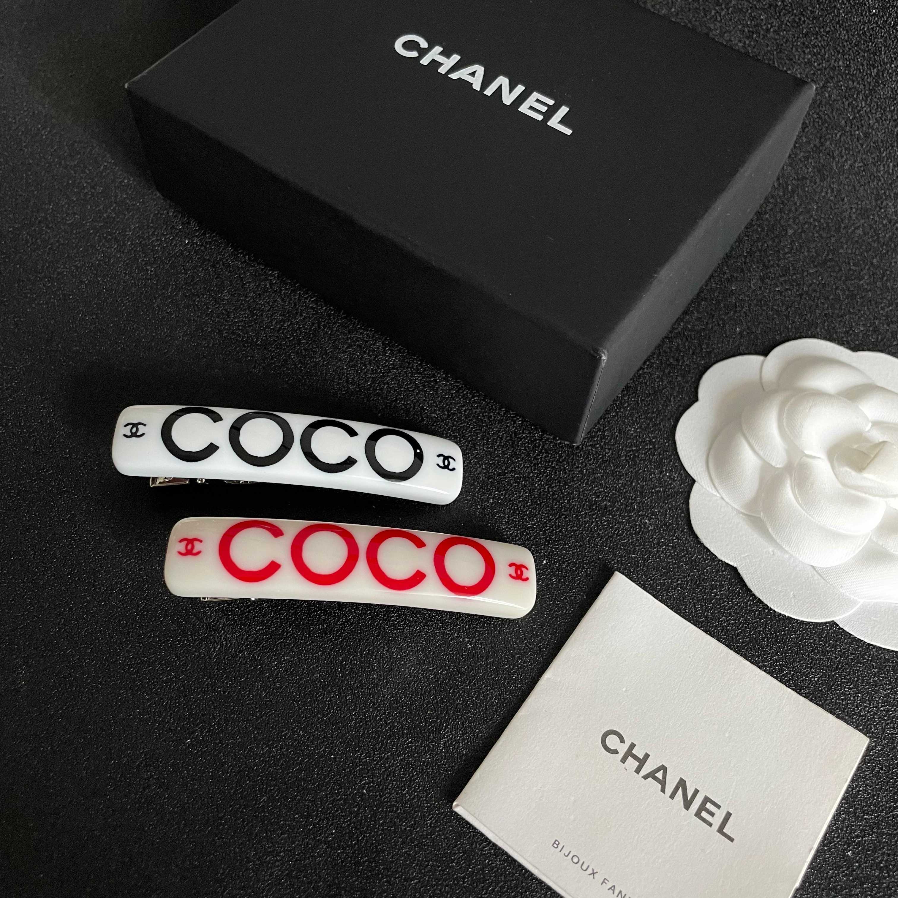 Chanel COCO brooch white base with red printed logos and text 6cm