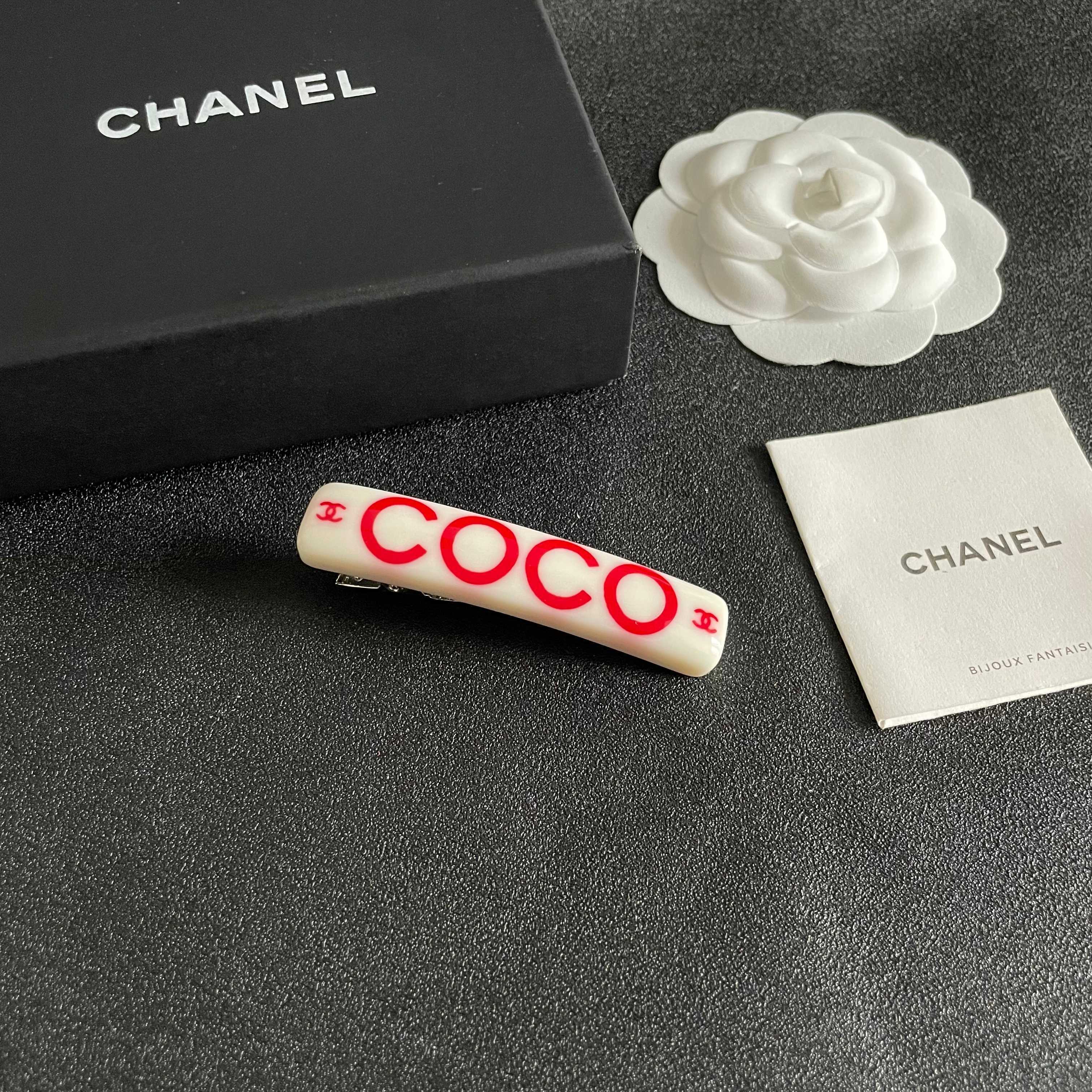 Chanel COCO brooch white base with red printed logos and text 6cm
