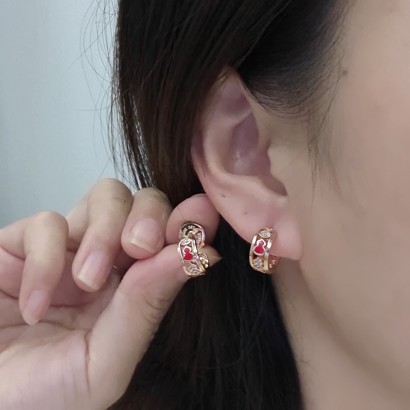 Qeelin Wulu earrings gold-tone metal red enamel clear diamond simulants 10mm hoop diameter