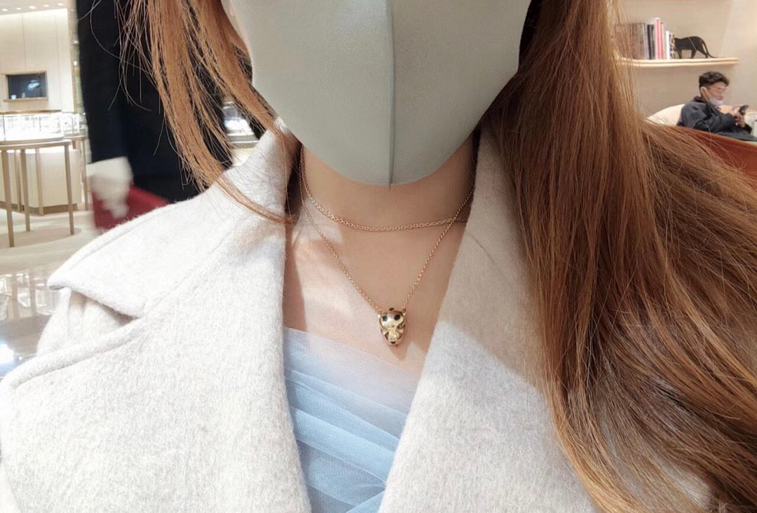 Cartier Panthere de Cartier necklace 18k yellow gold tsavorite green garnet eyes black onyx accents 42cm with 2cm extender