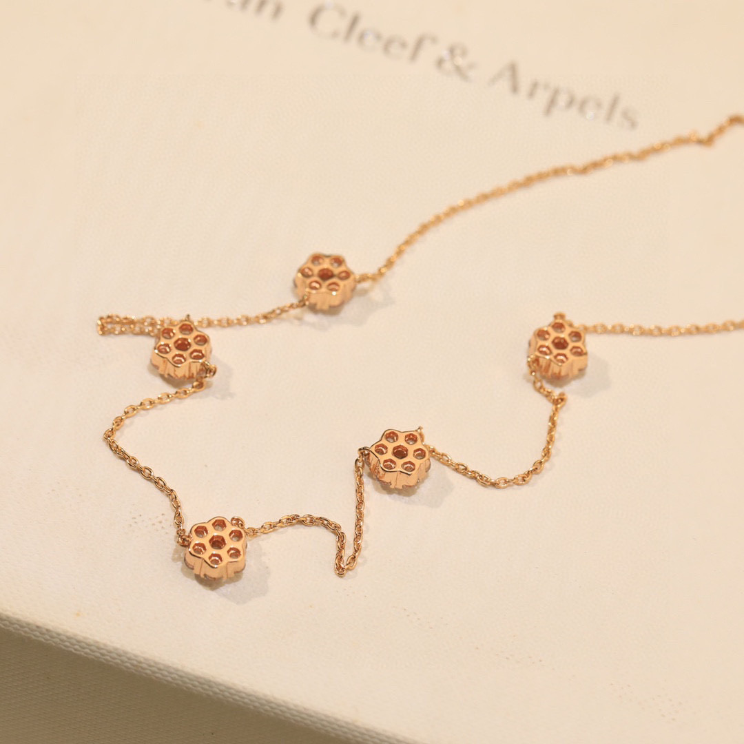 Van Cleef Arpels Fleurette necklace 18k rose gold with clear diamonds 18k white gold with clear diamonds 42cm
