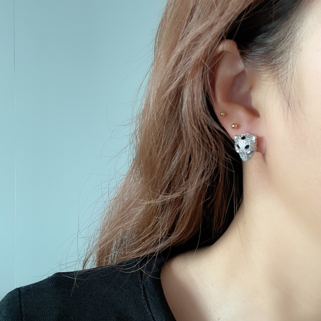Cartier Panthere de Cartier earrings 18k yellow gold with pave diamonds emerald eyes black onyx accents 8mm stud diameter