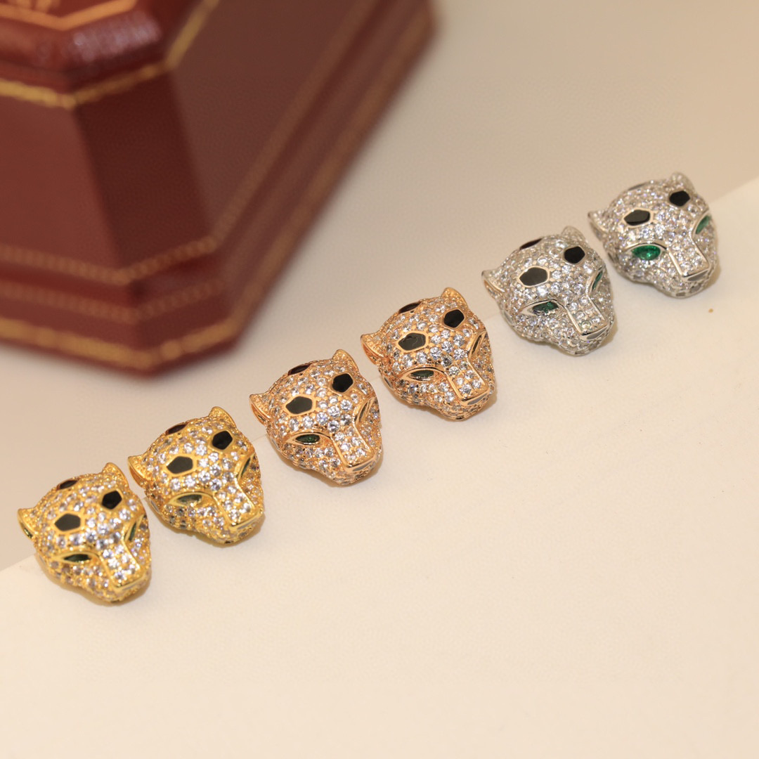 Cartier Panthere de Cartier earrings 18k yellow gold with pave diamonds emerald eyes black onyx accents 8mm stud diameter