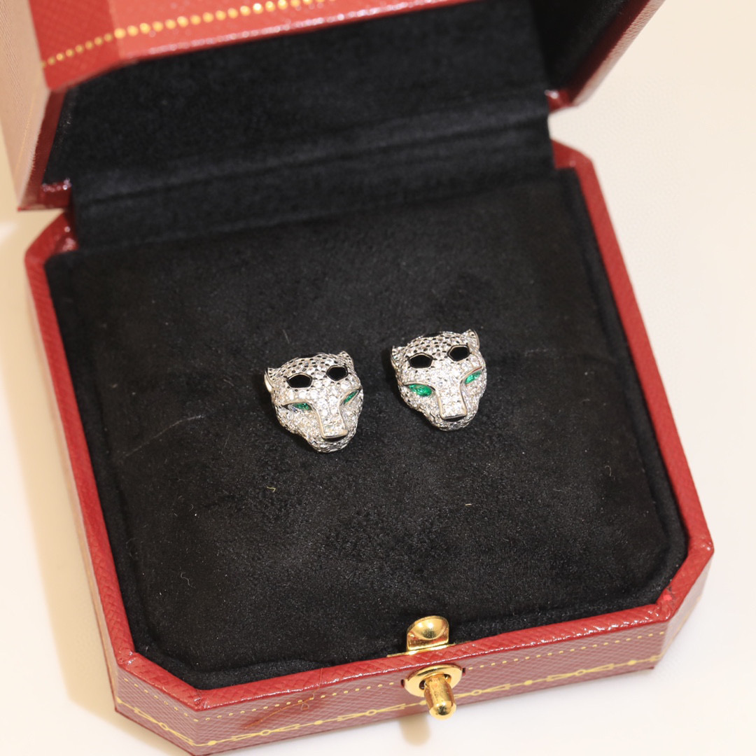 Cartier Panthere de Cartier earrings 18k yellow gold with pave diamonds emerald eyes black onyx accents 8mm stud diameter