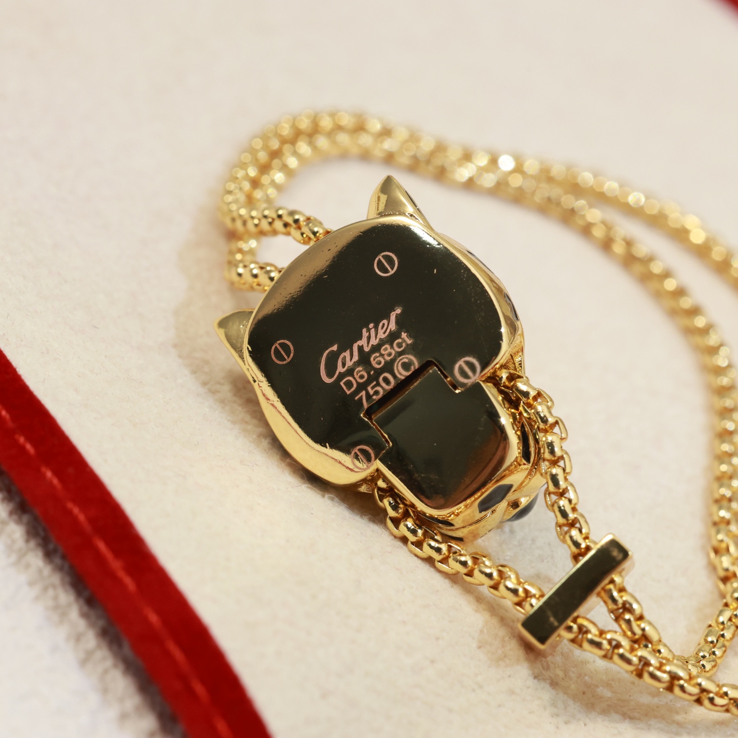 Cartier Panthere de Cartier bracelet 18k yellow gold black lacquer spots emerald green eyes diamond accent on slider adjustable sliding chain fits 15-19cm wrist