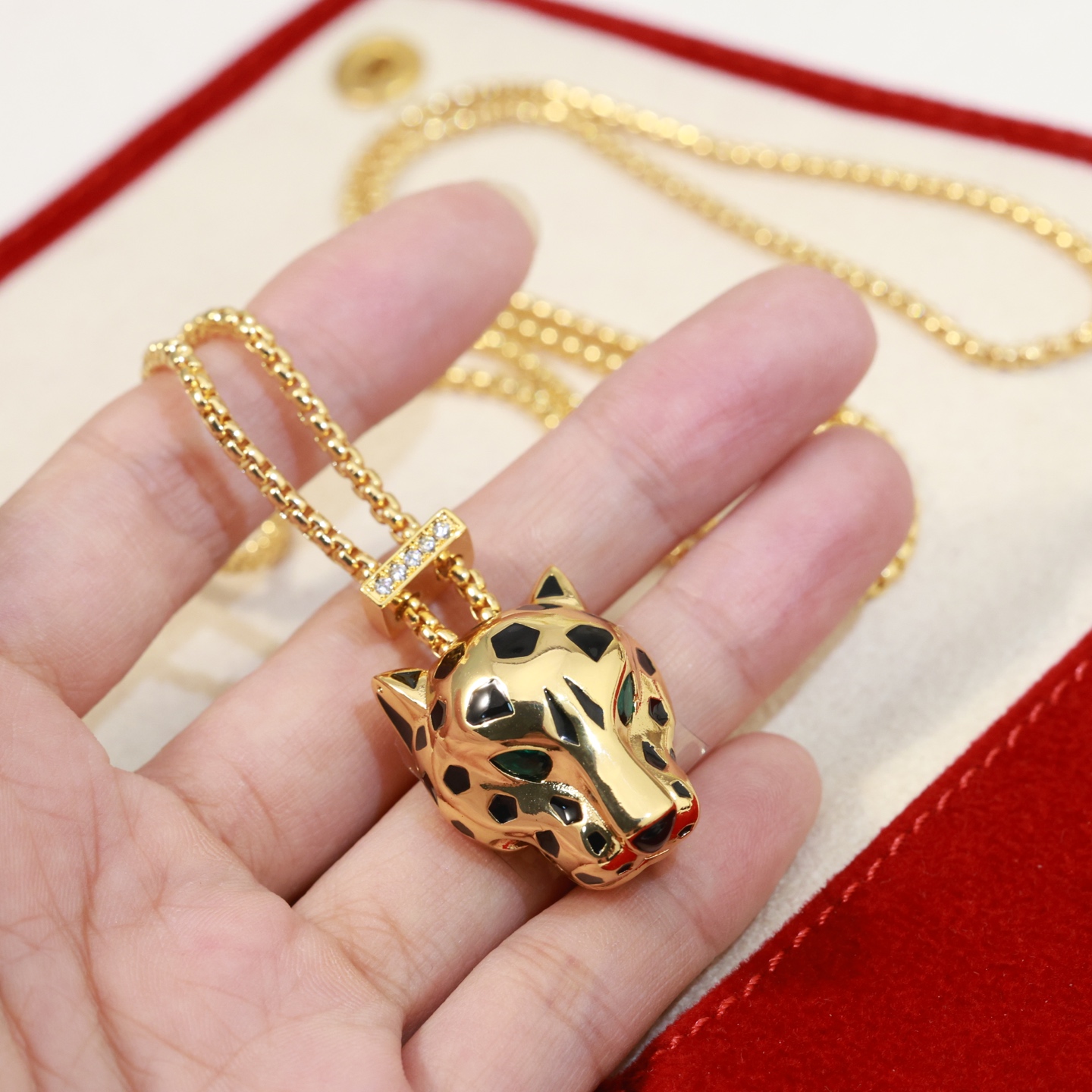 Cartier Panthere de Cartier necklace 18k yellow gold black lacquer green tsavorite garnet diamond accents 42cm