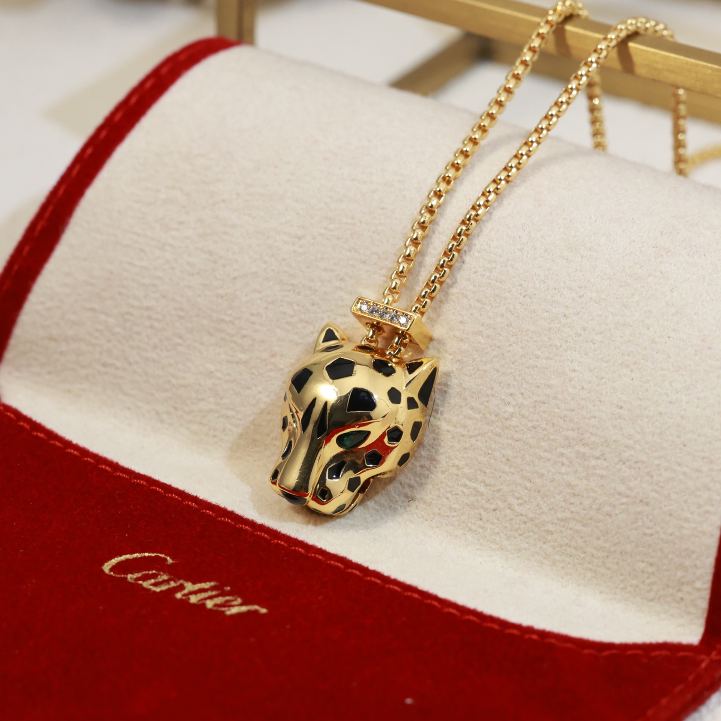 Cartier Panthere de Cartier necklace 18k yellow gold black lacquer green tsavorite garnet diamond accents 42cm